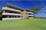 Right on the sands at Little Beach and walk to the heart of Nelson Bay