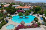 Tropical bungalow in Seru Coral Resort Curacao with beautiful gardens