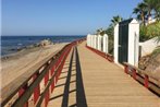 Front line beach bungalow with open sea views located in Mijas Costa Malaga CS105