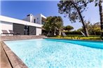 A holiday home with pool near the beach