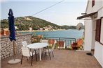 Apartments by the sea Tisno