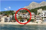 Apartments by the sea Podgora