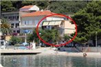 Apartments by the sea Podgora