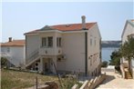 Apartments by the sea Stara Novalja