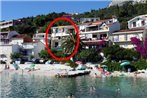 Apartments by the sea Podgora