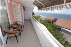 Apartments by the sea Podgora