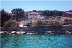 Apartments by the sea Arbanija