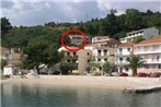 Apartments by the sea Podgora