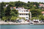 Apartments by the sea Tisno