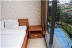 Affordable 2BR At L'Avenue Apartment By Travelio