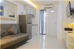 Pool View 2BR with Sofa Bed Bassura City Apartment By Travelio