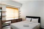 Simply Furnished Studio Apartment at Scientia Residence By Travelio