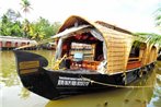 Houseboat cruise in the backwaters of Kerala.
