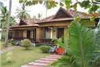 Maadathil Cottages