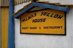 Malika's Yellow House