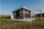 Modern chalet with a panoramic view near the Oosterschelde
