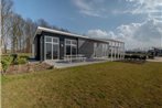 Modern cottage with a fireplace near the Oosterschelde