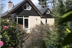 Cozy house with fireplace and garden in the forest