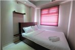 Homey and Relaxing 2BR Green Pramuka Apartment By Travelio