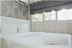 Cozy Room 1BR Gray Tower Sentra Timur Apartment By Travelio