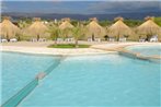 Arenas Blancas Caban~as & Suites