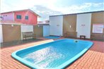 Estudio e Suites com Piscina