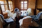 Chalet with view of the mountains and the Thun lake