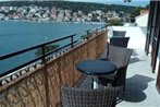 Apartments by the sea Tisno