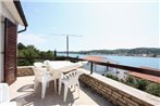 Apartments by the sea Tisno