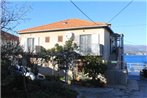 Apartments by the sea Arbanija