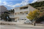 Apartments with a parking space Omis - 10351