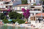 Apartments by the sea Podgora