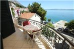 Apartments by the sea Podgora