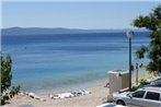 Apartments by the sea Podgora