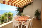 Apartments by the sea Podgora