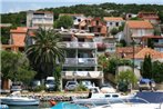 Apartments by the sea Tisno