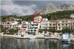 Apartments by the sea Podgora