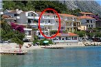 Apartments by the sea Podgora