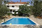 Apartments with a swimming pool Novalja