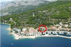 Apartments by the sea Podgora