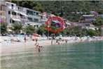 Apartments by the sea Podgora