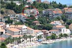 Apartments by the sea Podgora