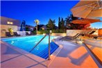 Family friendly apartments with a swimming pool Novalja