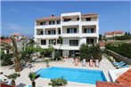 Family friendly apartments with a swimming pool Novalja