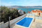 Seaside apartments with a swimming pool Arbanija