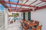 Four-Bedroom Apartment in Supetar