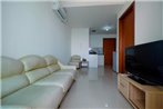 Cozy 1BR at Green Bay Pluit Apartment By Travelio