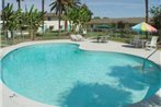 99 Palms Inn & Suites