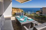 Villa Benagil with stunning views and roof terrace with private heated pool