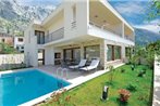 Three-Bedroom Holiday home Makarska with Sea view 07